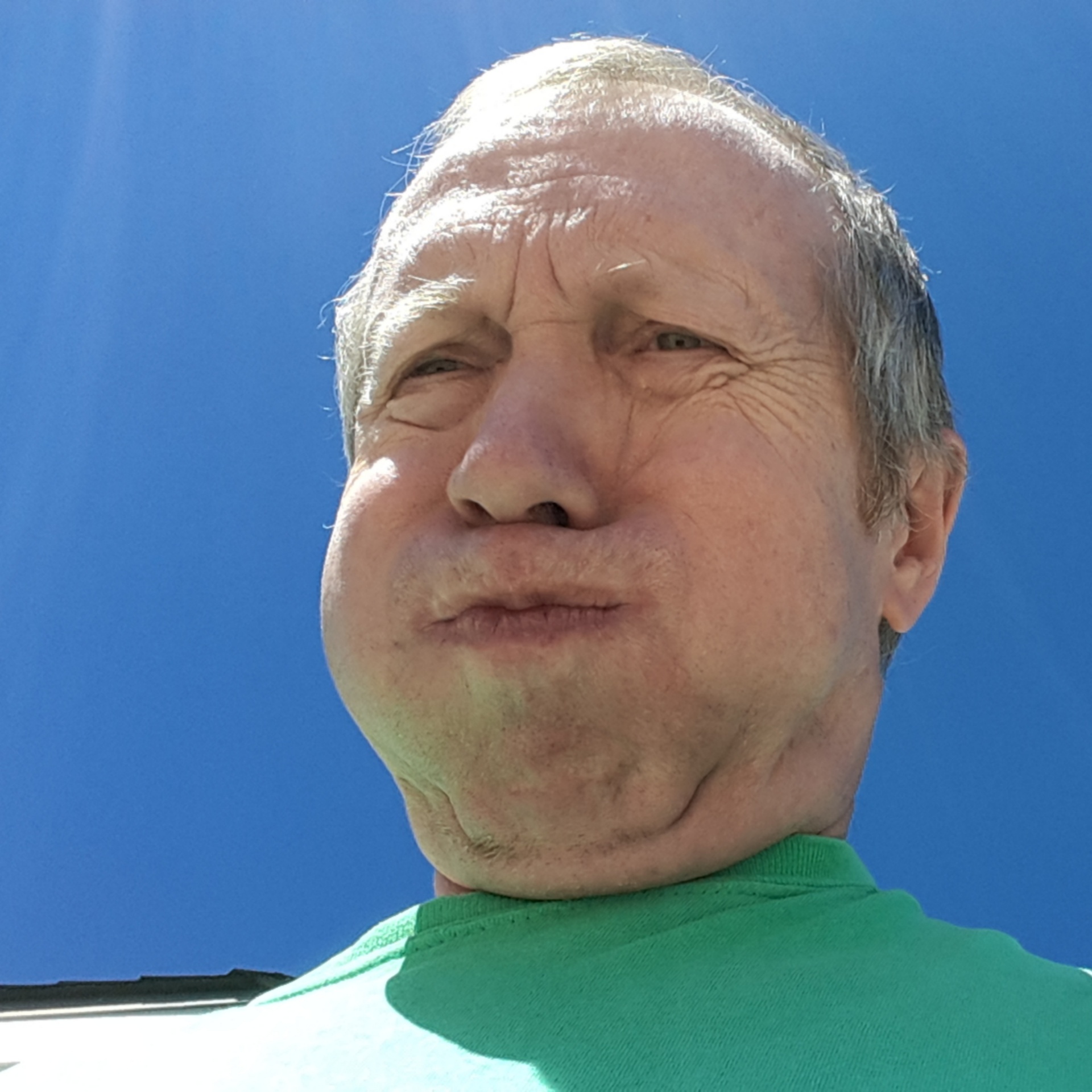 man blowing wind